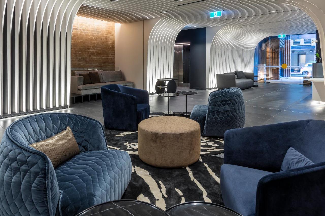 Skye Suites Sydney Sidney Exterior foto The lounge at the airport