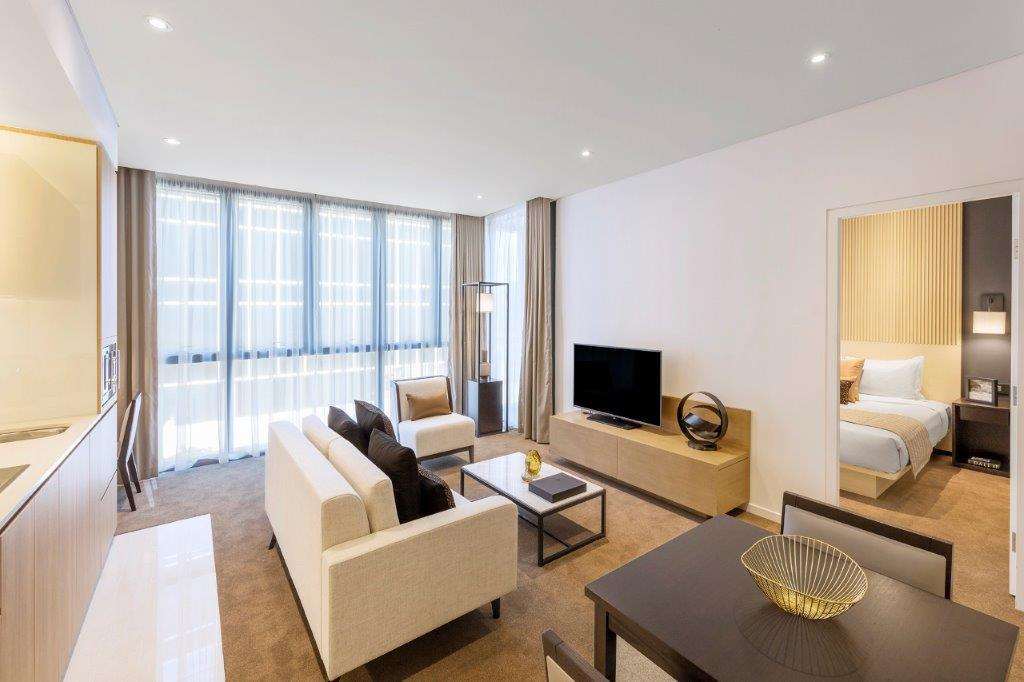Skye Suites Sydney Sidney Quarto foto A living room at the hotel